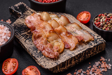 Delicious bacon in the form of slices with salt, spices and herbs