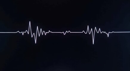 A close up of a black background with a white line of a heart beat