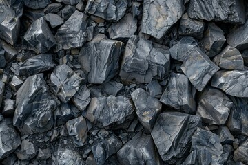 Big pile of natural black coals. Detailed photo textured background