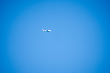 twin engined jet liner aircraft in deep blue sky
