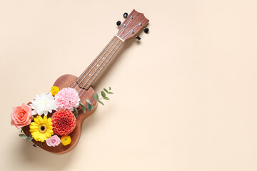 Composition with ukulele and beautiful flowers on color background
