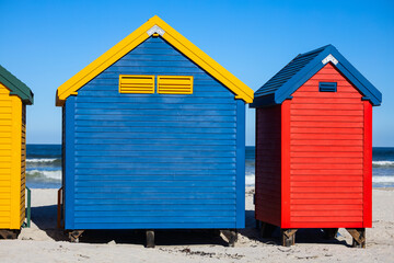 Naklejka premium Iconic colorful Victorian beach huts at Muizenberg Beach