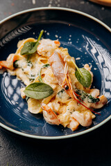 Gourmet shrimp pasta in creamy sauce, beautifully plated for an indulgent dining experience
