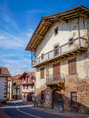 Fototapeta premium Village street with picturesque buildings