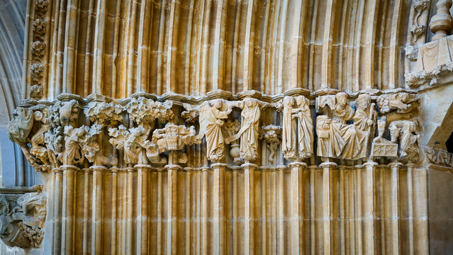 Images carved in stone located in the portico of a church