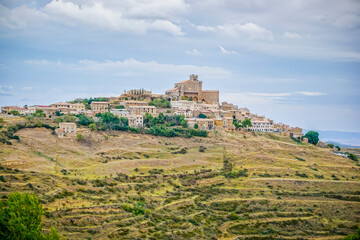 Overview of the town of Ujue in the autonomous community of Nacarra, with the fortress church of...