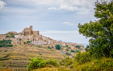 Overview of the town of Ujue in the autonomous community of Nacarra, with the fortress church of Santa Maria, a monumental complex of medieval origin