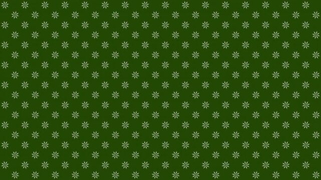 Fondo de color verde con patrones de copos de nieve rotando