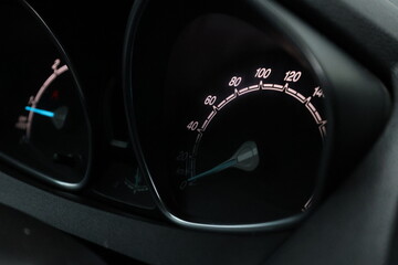 Naklejka premium Close up shot of a speedometer in a car. At an engine speed of 1800 rpm on Car dashboard.
