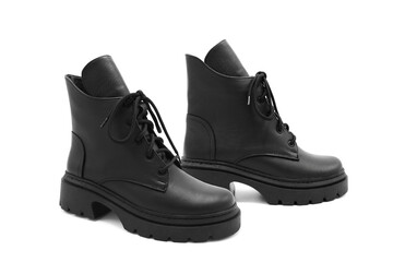 Fashionable leather lace-up boots with heels isolated on white background. View from all sides.