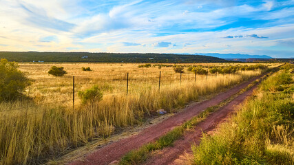 Aerial of Rural Dirt Road and Golden Fields Gooseberry Mesa Utah