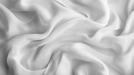 Obraz premium White wrinkled fabric with delicate folds and creases emphasizing the texture