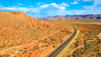Aerial of Red Rock Desert and Winding Road in Utah