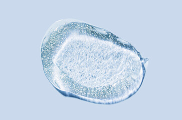 Scrub with polymer particles, salt or sugar with micro capsules and glitter texture. Cosmetic...