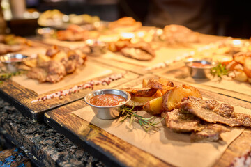 Enjoying Delicious Chicken Wings Accompanied by Fresh Sides and Tasty Sauces for All