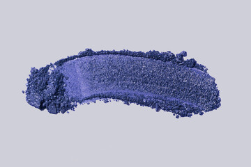Blue broken and scattered eye shadow dust smudge grey isolated background