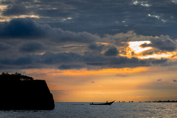 Sunset with fishermen on Lake Victoria