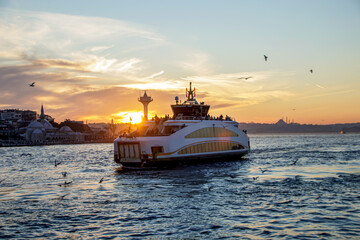 Fototapeta premium ship at colorful sunset in the bosphorus in istanbul, constantinople