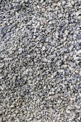 Granite gravel texture background with natural stone pebbles