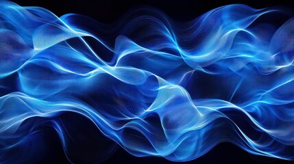 Obraz premium Abstract blue wave flowing on dark background.