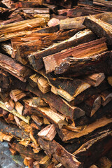 Stack of chopped firewood for winter heating and fireplace use