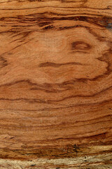 Natural wood grain texture with warm brown tones and organic patterns