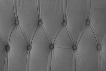 Capitone, diamond checkered soft fabric textile decorative background with buttons. Classic retro...