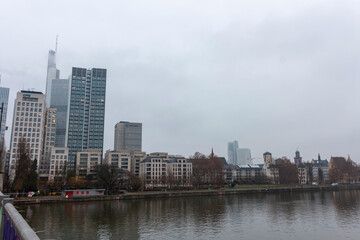 View of the Frankfurt skyline from the Untermainbr&uuml;cke (Lower Main Bridge) on a cloudy day