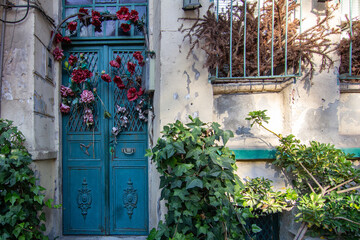 You will find the visual you are looking for in these photographs consisting of colored wood, metal and ornate doors.