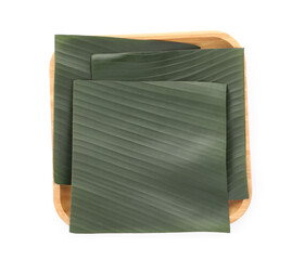 Pieces of banana leaves isolated on white, top view. Traditional meal serving