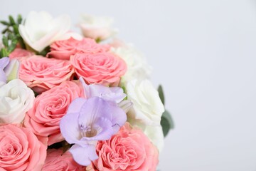Beautiful wedding bouquet on light background, closeup. Space for text