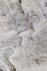 Close-up of natural beach sand with subtle patterns and textures