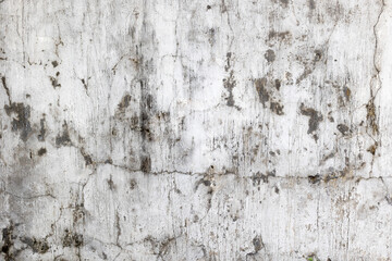 Aged weathered concrete wall with cracks and stains
