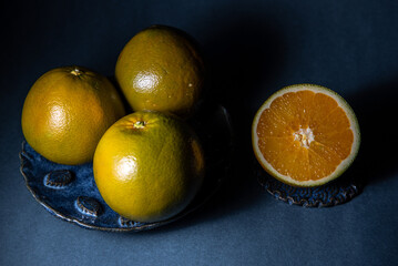 Chocolate ​​orange on the dark background.