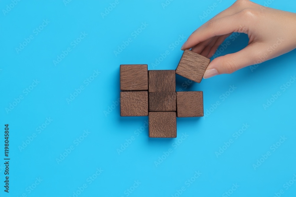 Poster hand-arranged wooden blocks forming steps with an upward arrow to depict a ladder career path for bu