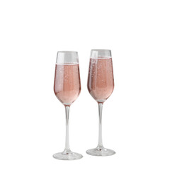 Elegant crystal champagne flutes with bubbling ros