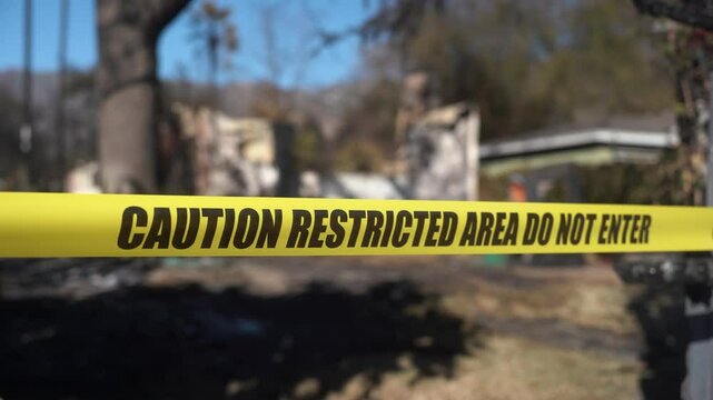 Caution tape is placed around a restricted area following an incident to ensure safety