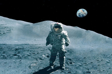Astronaut is walking on the moon. With land on the horizon. Elements of this image were furnished by NASA. 