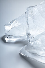 close up melting ice pieces on a white background