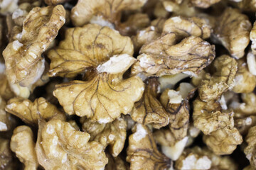 Peeled walnuts food background close-up