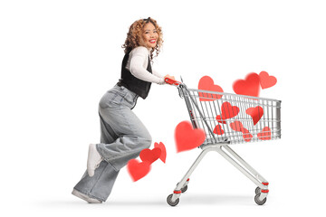Asian woman in love running and pushing a shopping cart with hearts