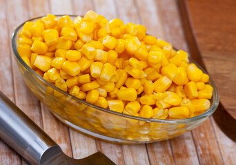 Closeup of appetizing grains boiled corn on plate