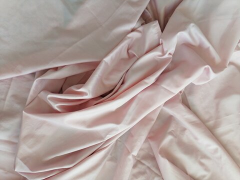 Delicate Details and Close-Up of Crumpled Light Pink Silk