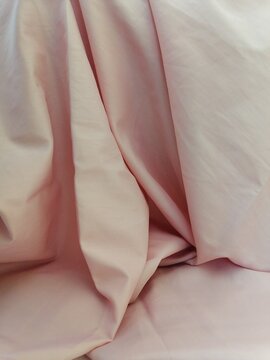 Delicate Details Crumpled Light Pink Silk Close-Up