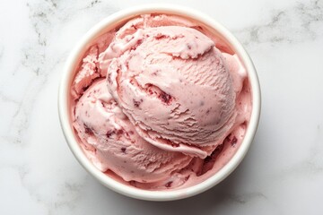 Two scoops of strawberry ice cream in a bowl. Perfect for food blogs, dessert menus, or summer promotions.