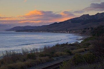 The sun sets over the chilly Pacific Ocean from the 101 near Santa Barbara