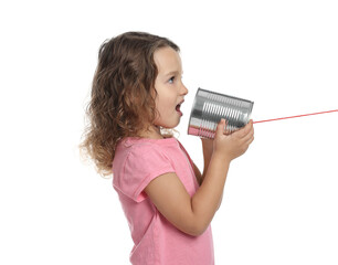 Girl using tin can telephone on white background