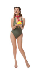 Happy pin-up woman in swimsuit with rubber duck on white background