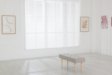 Interior of modern art gallery with beautiful paintings