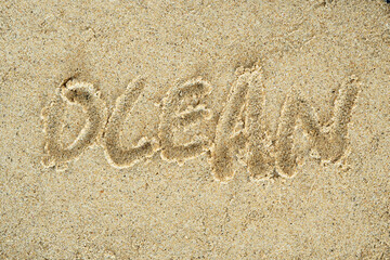 word ocean written on the beach sand